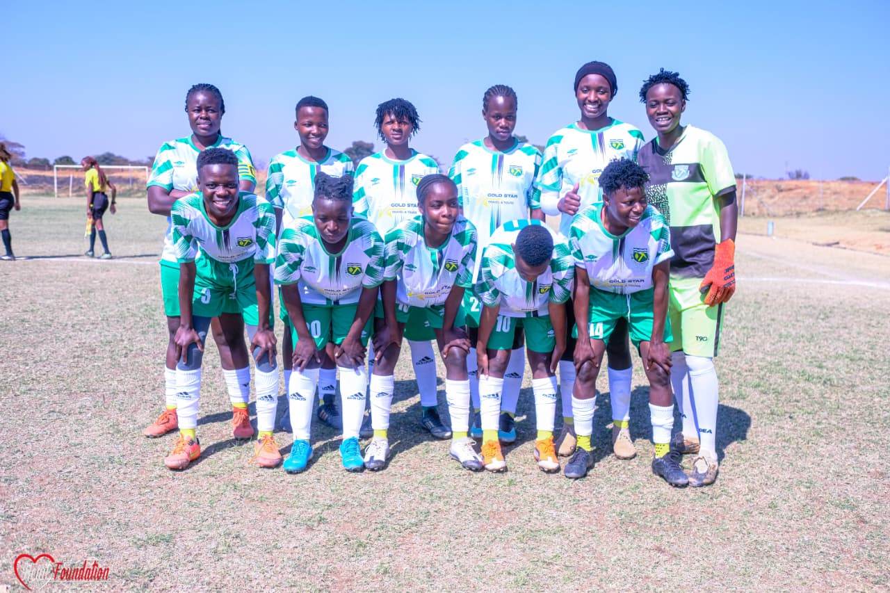 The starting eleven posing for a team photograph before kick-off